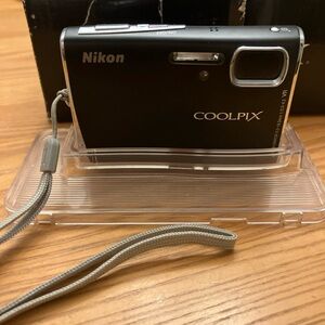 Nikon COOLPIX S51 Black Digital Camera with accessories and manuals in box